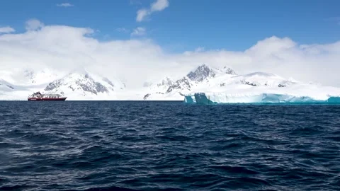 Expedition ship iceberg mountains ocean Antarctica landscape, 4K Stock Footage 332399078