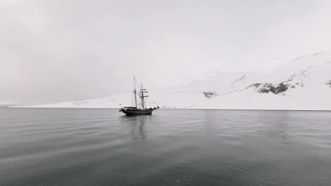 Expedition Ship Sailing Through Arctic Fjord in Svalbard, Norway Stock Footage 339277420