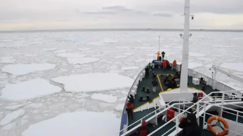 Expedition vessel moving through ice in Antarctic 스톡 동영상 33603952