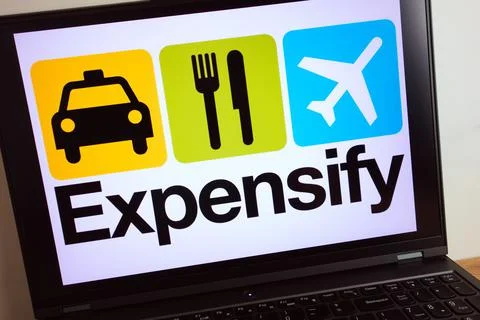 Expensify software company logo displayed on laptop Stock Photos