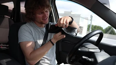 Expensive car maintenance drains drivers budget and leaves wallet empty Stock Footage 343719650