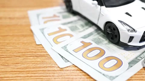 Expensive car payments loans maintenance and financial burden Stock Footage 251515937
