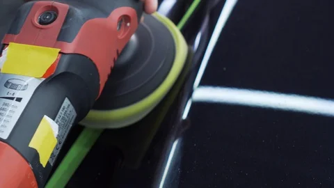 Expensive car is repaired in car workshop remove dirt and scratches, polish body Stock Footage 115932294