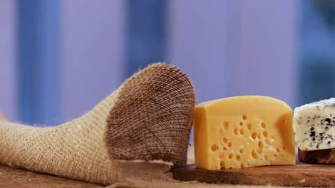 Expensive cheese with flags Stock Footage 74930123