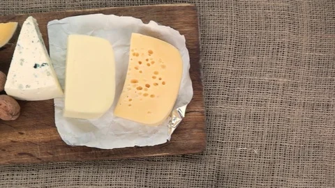 Expensive cheeses with walnuts Stock Footage 74820341