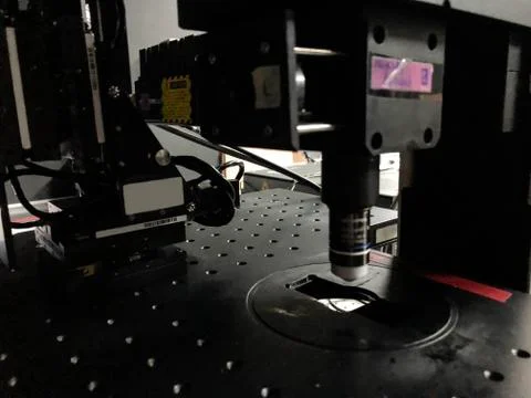 Expensive confocal microscope in the process of working. Fluorescence Stock Photos