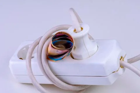 Expensive electricity - multiple socket with banknotes Stock Photos