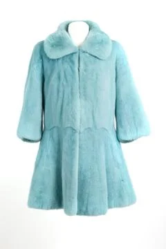 Expensive fur coats collection on a mannequin Stock Photos