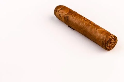 Expensive hand-rolled cigar on a while background Stock Photos