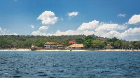 Experience an Amazing Tranquil Beachfront View, Surrounded by Lush Greenery.. Stock Photos