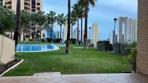Experience the Beautiful Poolside View That Showcases Striking Modern Archi.. Stock Photos