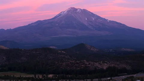 Experience the Breathtaking Aerial View of Mount Shasta as the Sun Sets Overhead Stock Footage 286775307