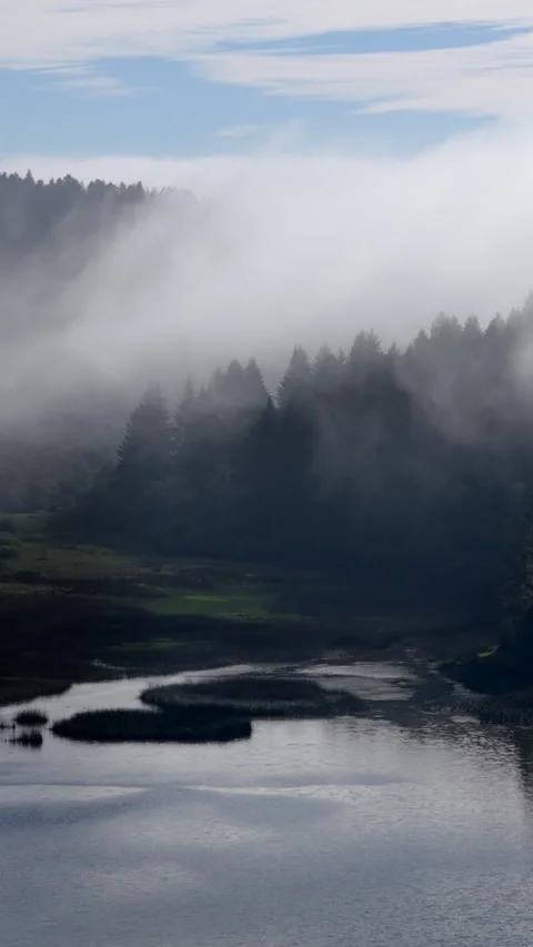 Experience a Breathtaking Aerial View of a Mystical and Misty Landscape That Stock Footage 285367498