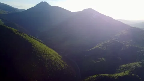 Experience the breathtaking aerial views showcasing the lush green mountains 스톡 동영상 293708450