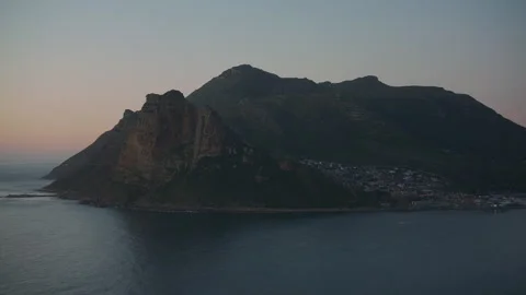 Experience breathtaking cliffs and ocean views in South Africa's scenic bay at Stock Footage 288080686