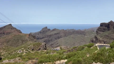 Experience the breathtaking coastal views offered from high mountain peaks in Stock Footage 317075680
