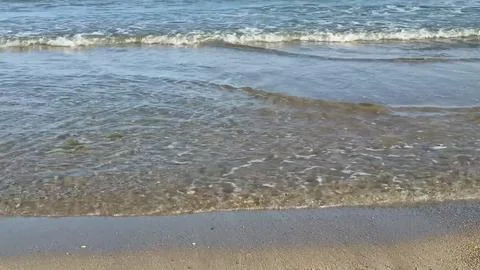 Experience breathtaking ocean waves and serene beach views waiting for you .. Stock Photos
