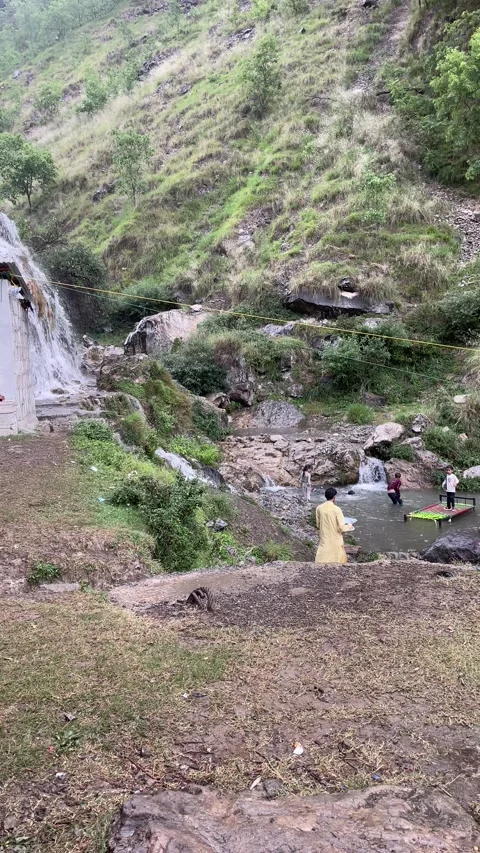 Experience the breathtaking power of a natural waterfall Stock Footage 311808747