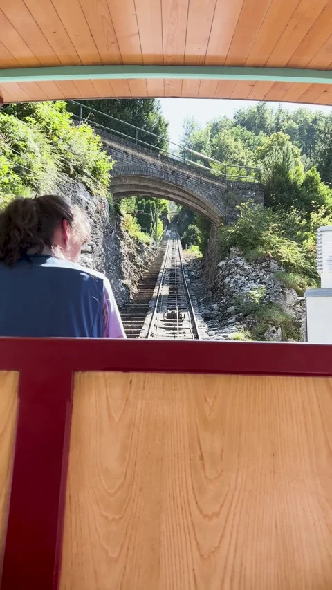 Experience the breathtaking scenic view from a train traveling on a steep Stock Footage 307425921