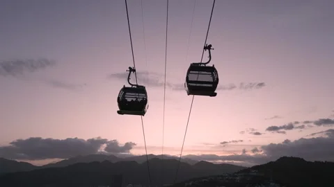 Experience breathtaking views from the cable car in the tranquil mountains Stock Footage 308246893
