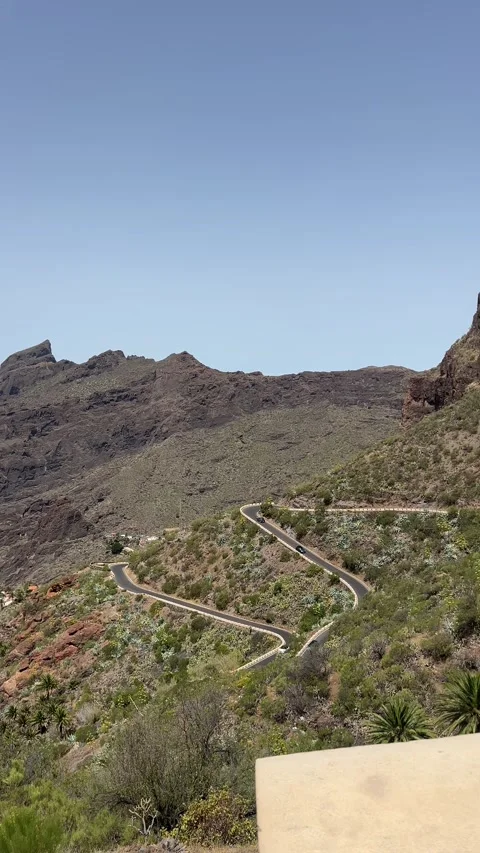 Experience breathtaking views of coastal mountains complemented by a stunning Stock Footage 319005354
