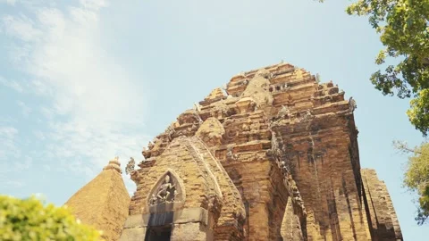 Experience the captivating beauty of Ancient Temple Architecture illuminated by Stock Footage 318385538