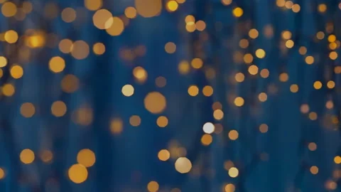 Experience the captivating Bokeh Effect with shimmering Golden Lights against a Stock Footage 295801189