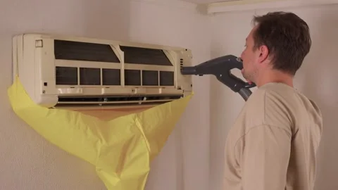 Experience the comprehensive Air Conditioner Cleaning Service in full action Stock Footage 314219963