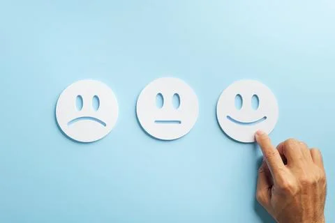 Experience customer feedback, hand selecting happy face showing positive sa.. Stock Photos