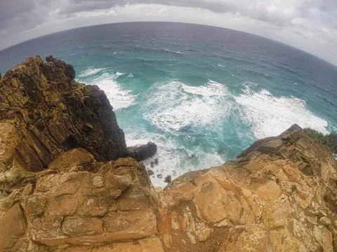Experience a Dramatic Coastal View from a Rocky Outcrop Overlooking the Stock Photos