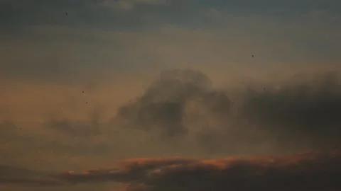 Experience a Dramatic Sunset Cloudscape that features breathtaking, Colorful Stock Footage 318065046