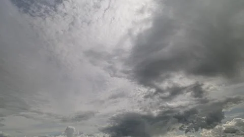 Experience the dynamic and everchanging cloud patterns that fill the sky above u Stock Photos