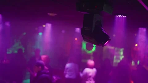 Experience a Dynamic Party Atmosphere Enhanced by Colorful and Engaging Lighting Stock Footage 310179711