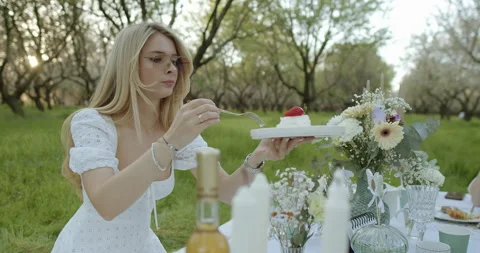 Experience an elegant outdoor dining setup amidst the breathtaking beauty of Stock Footage 307932146