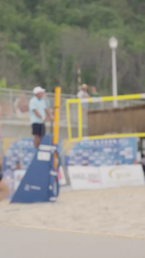 Experience the excitement of beach volleyball, emphasizing teamwork, skill, and Stock Footage 280139773