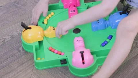 Experience the Fun and Excitement of the Engaging Hungry Hungry Hippos Game with Stock Footage 315190729