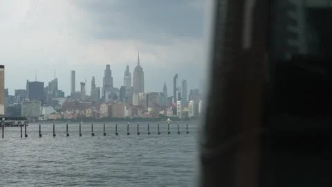 Experience the Iconic Skyline Views of New York City Enhanced by Moody Skies Video stock 316512034