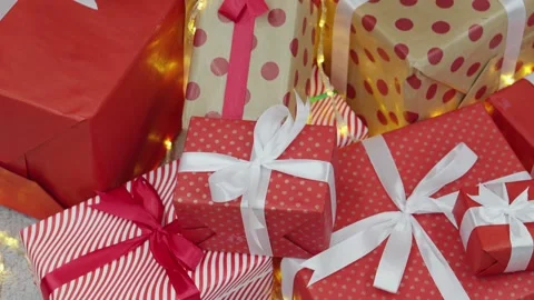 Experience the joy of festive holiday decor, featuring beautifully wrapped gifts 스톡 동영상 317026142