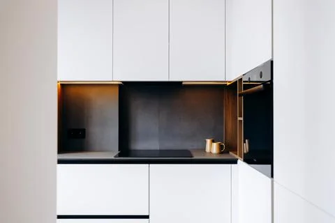 Experience a Modern Minimalist Kitchen that Features a Sleek Design and Inviting Stock Photos