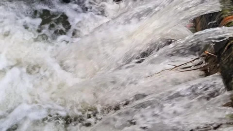 Experience the power of water in this captivating close up footage Stock Footage 332415769