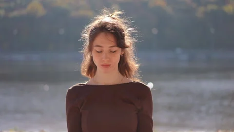Experience the profound tranquility of serene meditation by the calming water Stock Footage 285002964