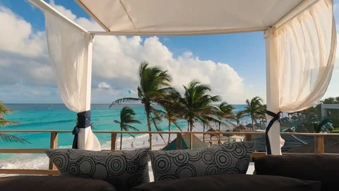 Experience a Serene Beachside Retreat that boasts a Luxurious Canopy and Stock Footage 297908433