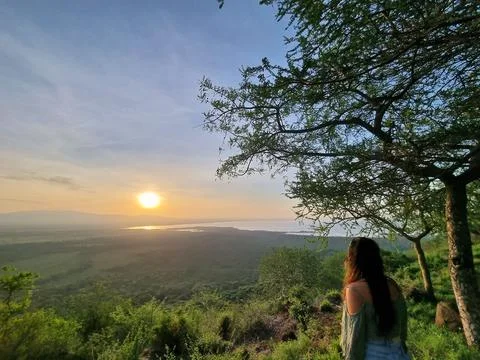 Experience a Serene Sunset View that Envelops Rolling Hills and Peaceful Stock Photos