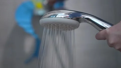 Experience the Shower Head in Action Enjoy a Refreshing, Invigorating Water Stock Footage 318543679