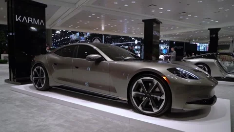 Experience the sleek and captivating design of Karma Automotive in showroom Vídeo Stock 291626141