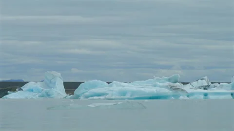 Experience the stunning and breathtaking view of Jokulsarlon Glacier Lagoon in Stock Footage 308358946