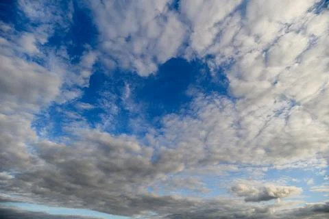 Experience a Stunning and Dramatic Cloudscape Featuring an Expansive Blue Sky Ab Stock Photos
