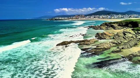 Experience the Stunning Coastal View Featuring Turquoise Waters and Soft Sandy Stock Photos