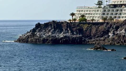 Experience the Stunning Coastal View Featuring a Hotel Beautifully Overlook.. Stock Photos