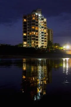 Experience the stunning reflection of the new building on Playas Beach in Stock Photos